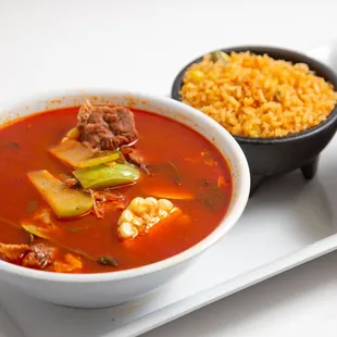 a bowl of soup and a bowl of rice