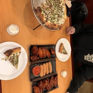 Carne Asada Pizza , Wings and Mozzarella Sticks