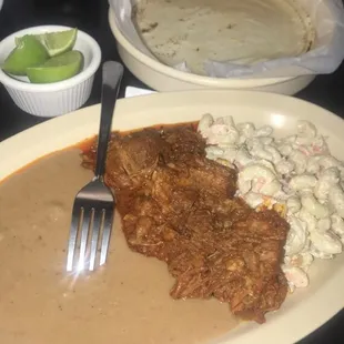 Barbacoa, Frijoles Puercos and  Sopa Fría served with a side of freshly hand made tortillas!