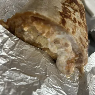 Chillequilles breakfast burrito with red sauce. Bomb.