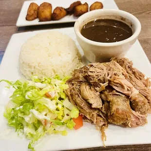 Penil (Roasted Pork), Black beans (they didn't have anymore Red beans), Sweet Plantains, and salad.