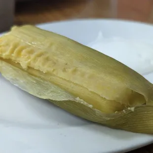 Corn tamale with sweet cream on the side