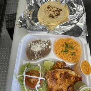 This is our pollo enchilado (chilli chicken) $13 comes with a side of rice and beans and a lil salad.