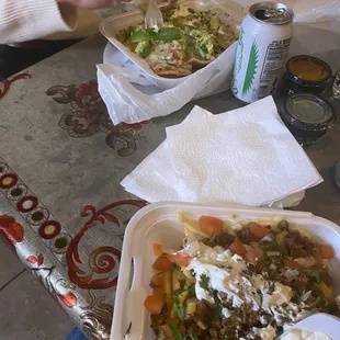 Carne asada fries and vegetarian nachos.