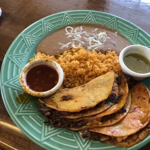 3 birria taco plate with rice and beans