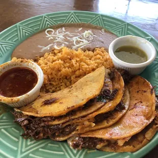 3 birria taco plate with rice and beans