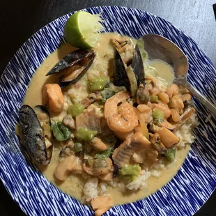 a plate of seafood and rice