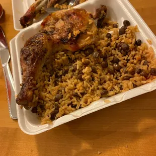 a plate of rice and meat