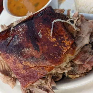 Pernil (Roasted Pork Shoulder with crispy skin).