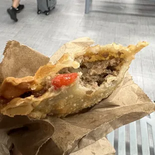 Amazing beef empanada! Ate at TSA but still so good.