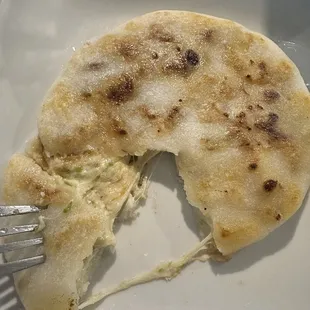 Pork, cheese, loroco pupusa