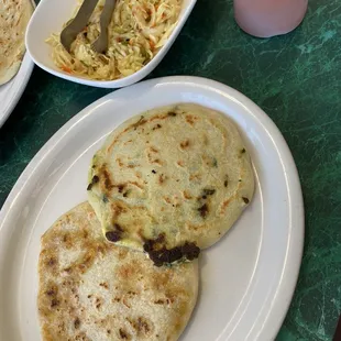 Pupusas, curtido and sauce