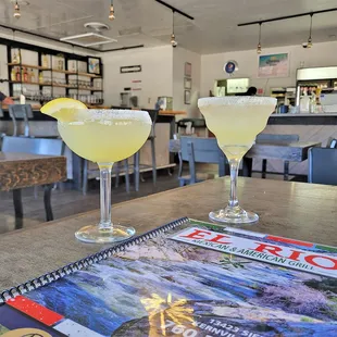 two margaritas on a table