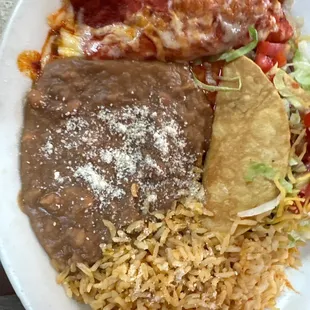 Taco, enchilada, rice and beans