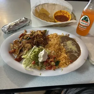 Lunch chicken fajitas and Mandarin Jarritos