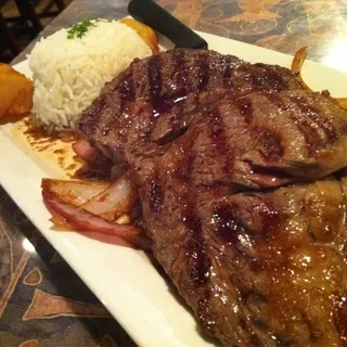 Carne a la Parrilla Encebollada