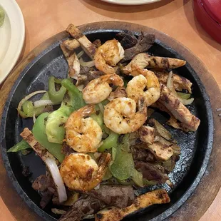 Parrillada for 2. Chicken was dry and very burnt.