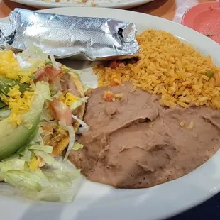 Combination #1 (chicken chalupa, carne asada taco, rice and beans) $8.99