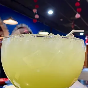 a margarita in a glass on a table