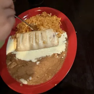 Chicken chimichanga with rice and beans