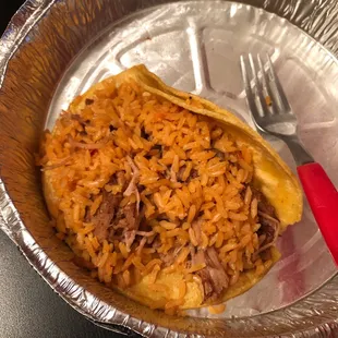 Carnitas taco in a corn shell with rice - delicious!!