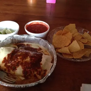 Burrito loco, with tomatillo sauce, big ass burrito , steak, chicken, I added chorizo , sour cream guacamole, ect... Awesome..
