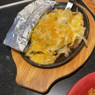 a skillet of food on a table