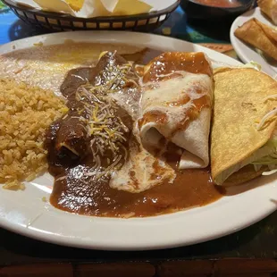 Pick Three 3 Items Make Your Own Combination Platter. Taco, Enchilada, and Burrito with rice and beans