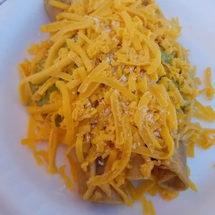 a plate of shredded cheese