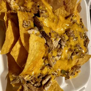 Super Chicken fajita nacho plate