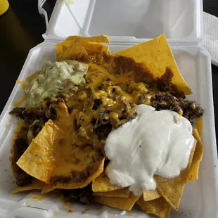 nachos in a styrofoam container
