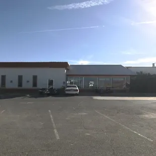 a white truck parked in a parking lot
