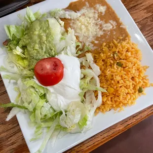 a plate of mexican food on a table