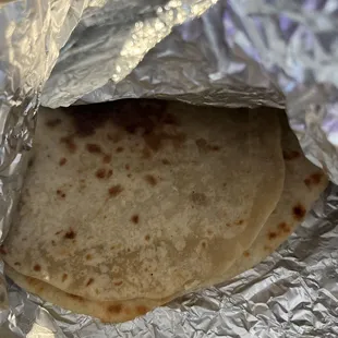 a tortilla wrapped in foil