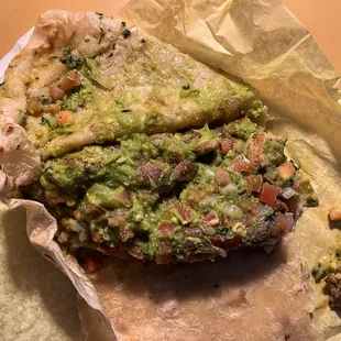 A close-up of the Chicken Burrito. Notice the colors. According to the menu it wasn&apos;t even supposed to have Pico de Gallo in it.