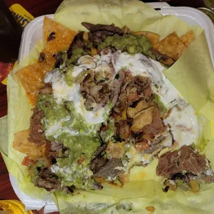 Carne asada nachos so yummy