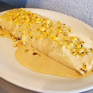 Chipotle Burrito Texanas. Unbelievable.  Steak shrimp and chicken. 2 meals on this one!