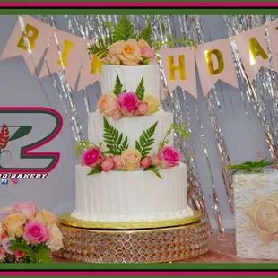 a birthday cake with flowers