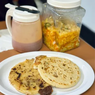 Our pupusas came with a giant container of pickled cabbage and sauce :)