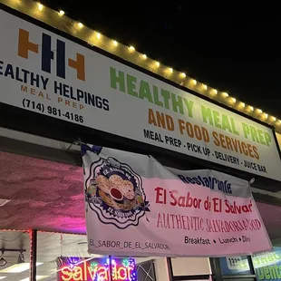 a sign for healthy meals and food services