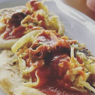 Pupusas revueltas with curtido and spicy salsa