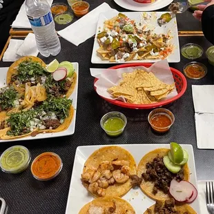 Tacos de Carnitas, shrimp tacos, Super Nachos, Birria Ramen