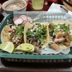 Left to right: pastor, steak, carnitas tacos