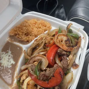 23 dollars for mixed fajitas. 4 shrimp... a little chicken..  Even less beef with copious amounts of onions and peppers