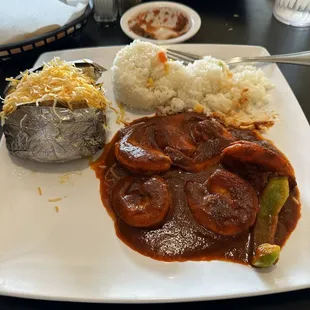 Camarones A La Diabla! Large shrimp, great loaded potatoe, with ehh non flavor rice.