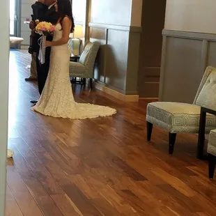 a bride and groom in a hotel lobby