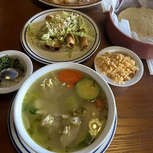 Caldo de pollo, taquitos, and an omelette.