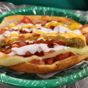 a hot dog with ketchup and mustard