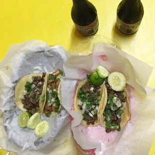 two tacos on a table