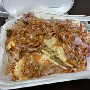 Cheese pupusas.. I made it look this messy.. I added all the condiments.. so good!